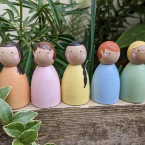 Little ones: pastel coloured peg dolls